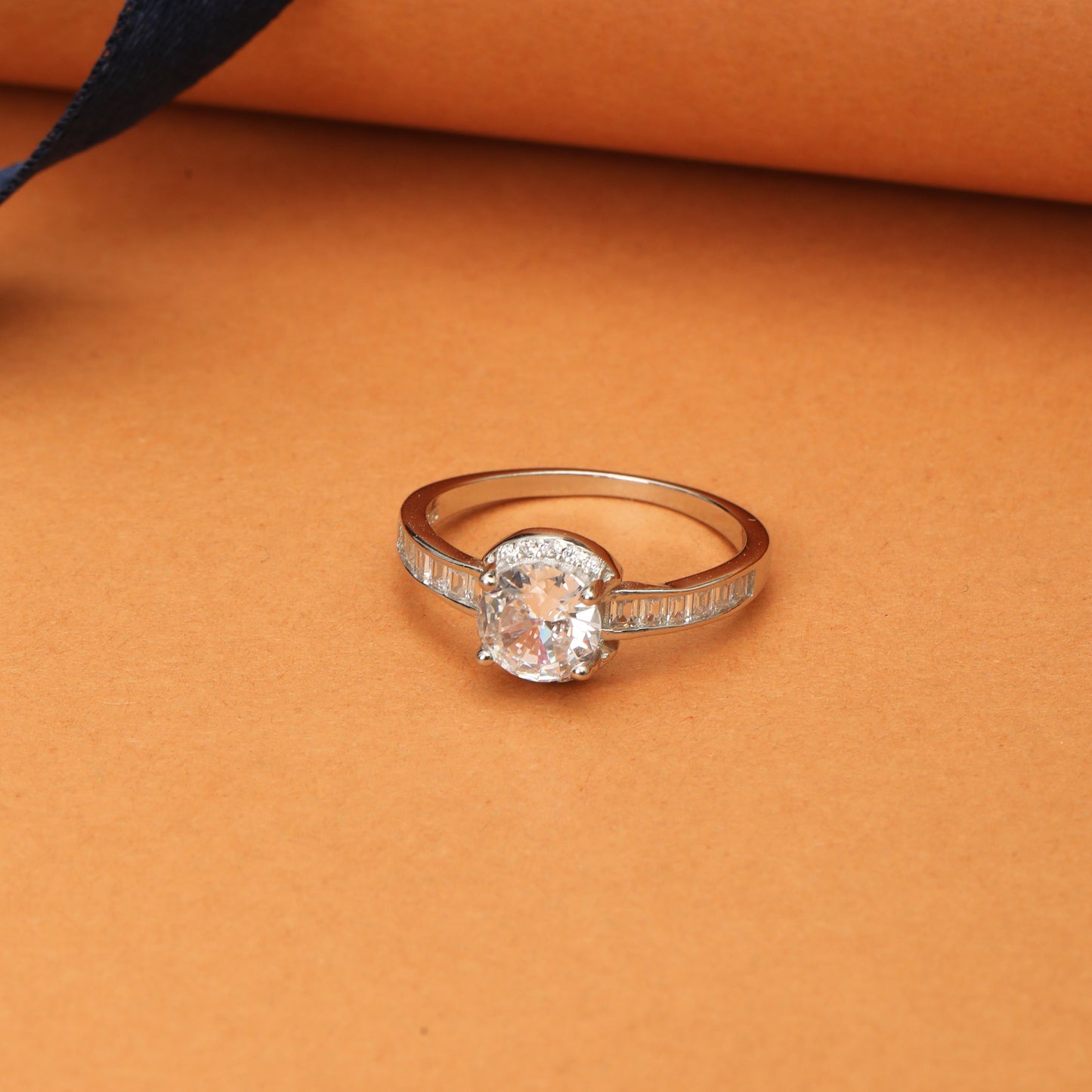 Round Solitaire Ring with Halo & Baguette Side Stones | Silver-Toned CZ Engagement Ring for Women