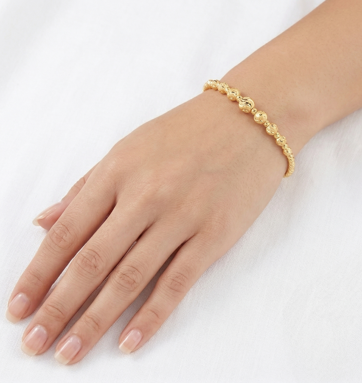 CNC-Cut Gold Spheres Bracelet